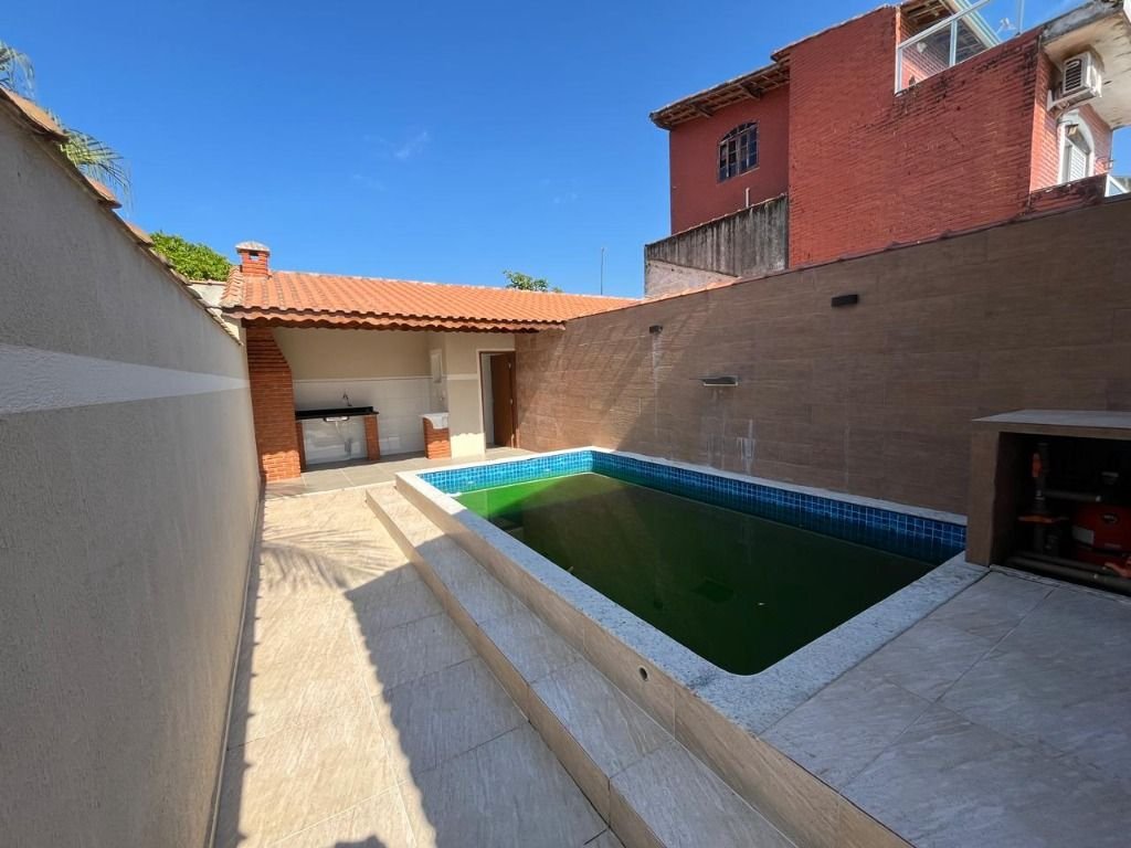Casa com 3 dormitórios à venda, 95 m² por R$ 449.000,00 - Oceanópolis - Mongaguá/SP