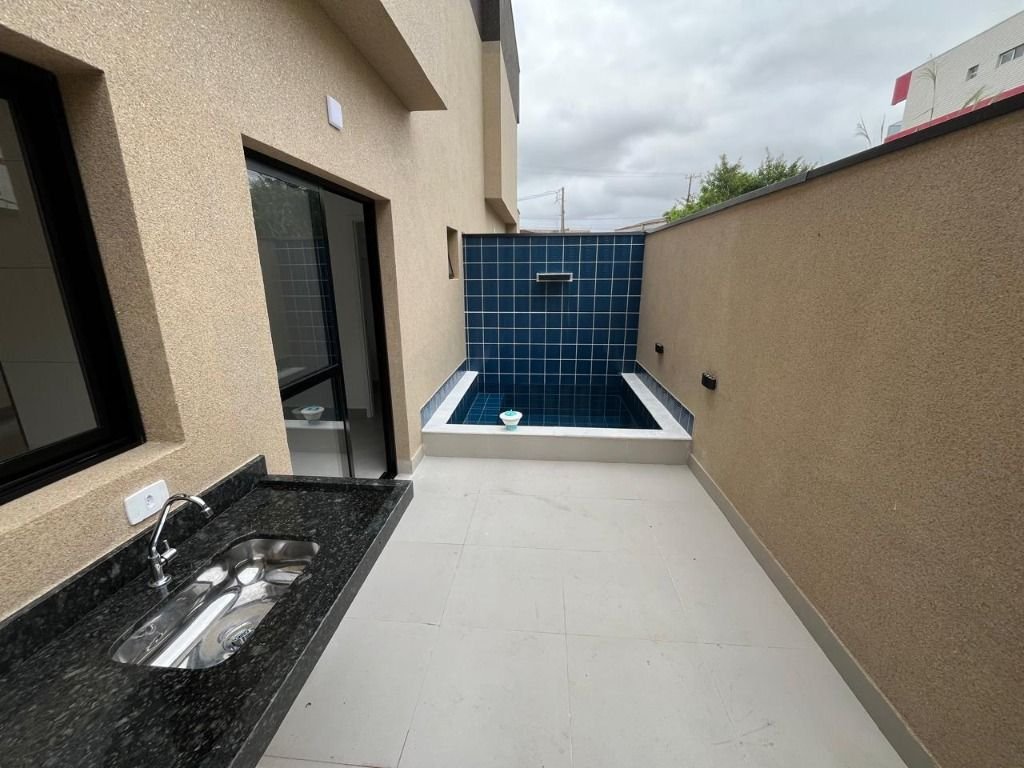 Village com 2 dormitórios à venda, 86 m² por R$ 420.000 - Vila Atlântica - Mongaguá/SP